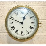 An Elliott Ltd brass ships bulkhead clock, the 20cm dial with Roman numerals and F/W, stencil to