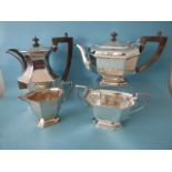 A plain octagonal four-piece tea service, each piece on raised octagonal foot, maker R W Burbidge (