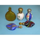 Two metal-mounted ceramic scent bottles, 54mm and 58mm high and three small glass scent bottles, (