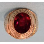 A 9ct gold American High School graduation ring set synthetic ruby, size S, 9g.