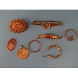 A 9ct gold fish charm, a small 9ct gold signet ring, two 9ct gold brooches and other items, (