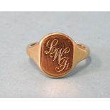 An 18ct gold signet ring with initials LWF, size S, 8.5g.