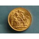 A George V 1913 gold sovereign.