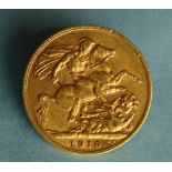 An Edward VII 1910 gold sovereign.