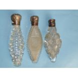 A Victorian silver-topped clear cut-glass scent bottle with etched initials 'EH' 100mm long and
