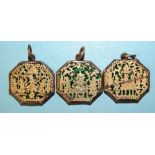 Three 19th century Indian Thewa octagonal pendants, (one cracked), 2.4 x 2.2cm, (3).