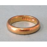 A 22ct gold wedding band, size O, 8.4g.