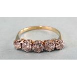 A diamond ring claw-set five graduated brilliant-cut diamonds totalling approximately 0.9cts, in