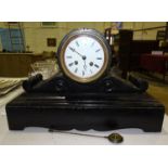 A late-19th century French black slate case clock, the drum movement stamped Marti, 25.5cm high,