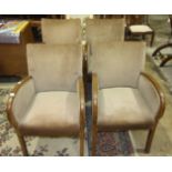 A set of four 1950's stained wood frame low chairs with upholstered seat and back, (4).