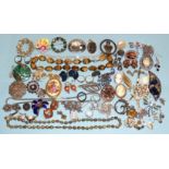 A small amount of silver-mounted jewellery, a cloisonné bead necklace and other costume jewellery.