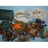 A quantity of vintage costume jewellery, a white metal neck chain and bracelet set by Pilgrim, two