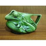 A CH Brannam grotesque novelty pottery green-glazed frog jug, inscribed C H Brannam, Barnstaple,