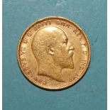 An Edward VII 1905 gold sovereign.