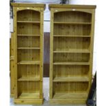 A set of modern pine narrow open adjustable shelves, 93cm wide, 198cm high, a similar narrower