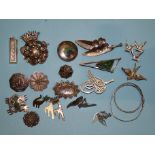 An American silver Beau brooch, a large Continental 800-silver armorial brooch and other silver
