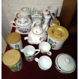 Seventeen pieces of Portmeirion 'The Botanic Garden' decorated kitchen ware, (some a/f).