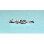 A small bar brooch centrally-set an 8/8-cut diamond of 0.02cts, in white metal mount, (tested as