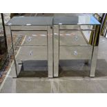 A pair of low mirrored two-drawer chests, 45cm wide, 60cm high, 35cm deep, (2).