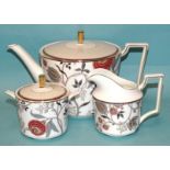 A Wedgwood 'Pashmina'-decorated teapot, sugar bowl with cover and milk jug, together with twenty-