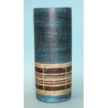 A Troika Pottery cylindrical vase, the lower half decorated with coloured bands, on a blue ground,