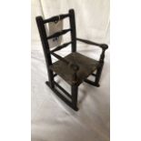 SMALL WOODEN ROCKING CHAIR