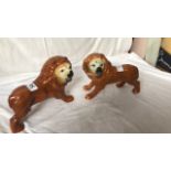 2 LION ORNAMENTS