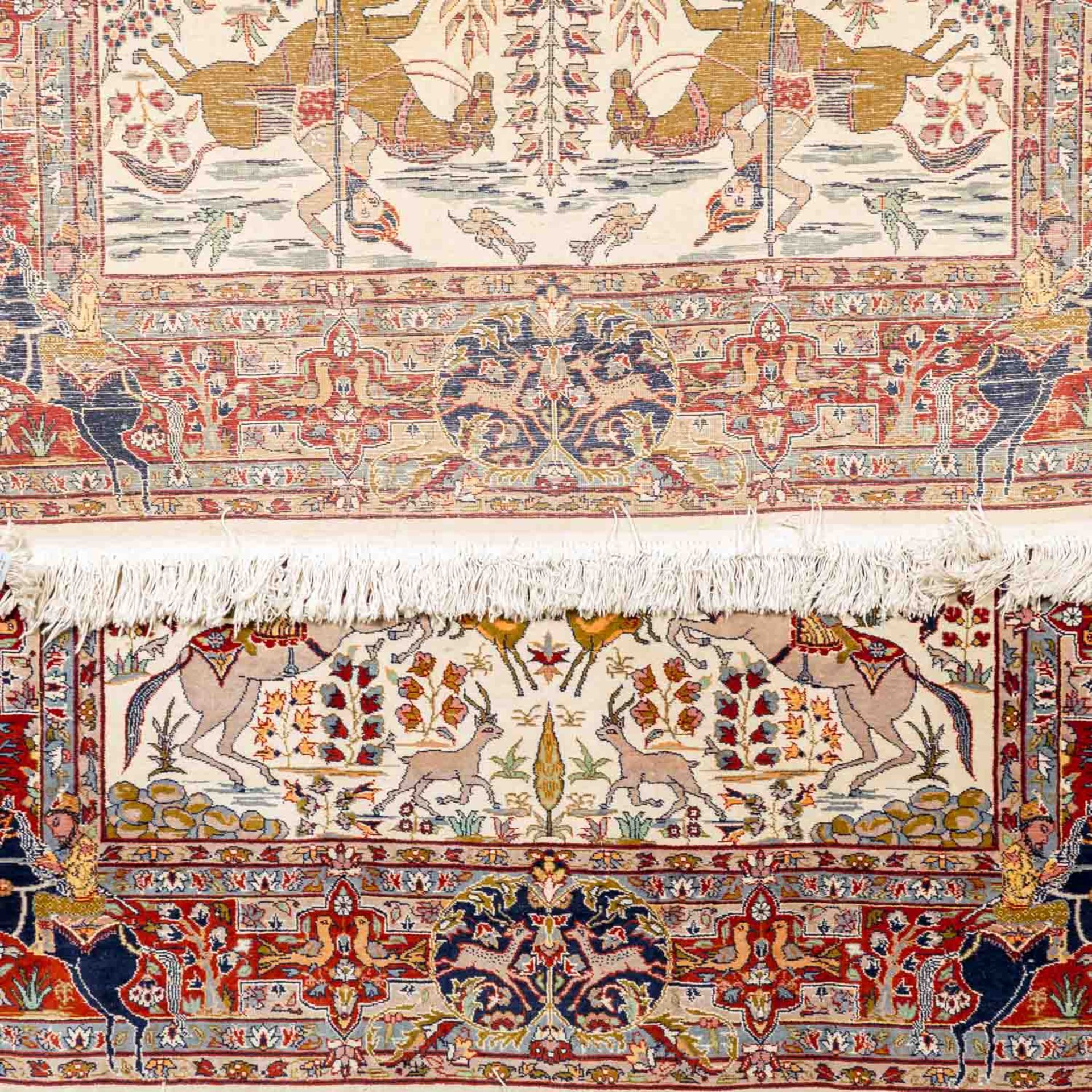 Jagdlicher Orientteppich, 20. Jh., 222x140 cm.Bildteppich mit Jagdreitern auf wollweis - Image 3 of 4