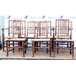 Set of seven country style oak dining chairs with rush seats (2 + 5)