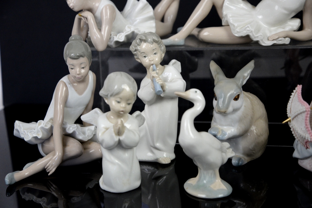 Lladro brown glaze girl carrying two water pails, and ten other figurines including Nao and a Lladro - Image 9 of 13