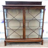 20th century mahogany astragal glazed cabinet on bracket feet. 137H x 122W X 38D