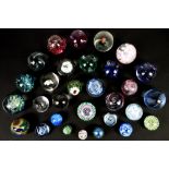Various glass paperweights, comprising Caithness, Isle of Wight and others (35+)