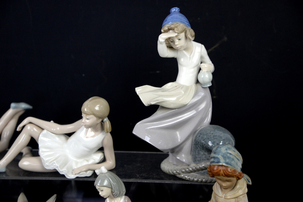 Lladro brown glaze girl carrying two water pails, and ten other figurines including Nao and a Lladro - Image 4 of 13