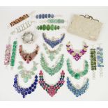 A very large mixed box of costume jewellery, including faux pearls, brooches, gem set necklaces,