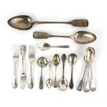 Selection of silver fltware to include a large serving spoon and a smaller example, two Norwegian