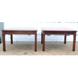 Pair of 20th century mahogany coffee tables with reeded supports. 47H x 76W x 76D
