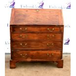 19th century mahogany bureau the fall front with a fitted interior above four gradated drawers on