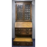 Oak bureau bookcase, with astragal glazed doors above bureau with fitted interior and three