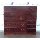 20th century stained pine Japanese chest of two long over four short and three further long drawers.