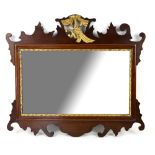 George III style fretwork mirror, with rectangular glass plate and pierced gilt eagle finial, 50cm