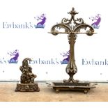 Iron stick stand with scrolling detail 87 H x 52W together with a cast iron Mr Punch doorstop