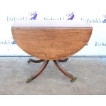 19th/20th century Pembroke table with quatrefoil base and splayed feet. 100W x 72H x 43D cm