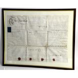 16th century framed indenture dated 1568, with two seals, 23 x 35cm, together with an 18th century