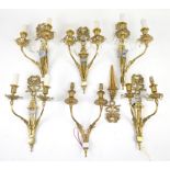 Set of six gilt metal two-branch wall sconces with glass drops (6)