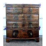 19th century bow fronted mahogany chest of two short over three long graduated drawers on bracket