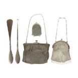 Two silver purses and a white metal smaller purse, together with a silver-mounted glove hook and