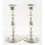 George V pair of silver candlesticks, by Ellis & Co (Ellis Jacob Greenberg), London 1932, with