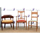 Pair of 20th century mahogany crossbanded armchairs together with a single oak chair and a