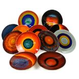 Poole Pottery 'Planets' set of dishes, designed by Alan Clarke, including Saturn marked 36,