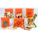 Eight Wedgwood Clarice Cliff pieces to include, a Christmas tree, h14cm, stylised horse,